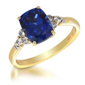3.25 Carat TW Created Blue Sapphire, Genuine White Topaz & Diamond Accent Ring in 10K Yellow Gold